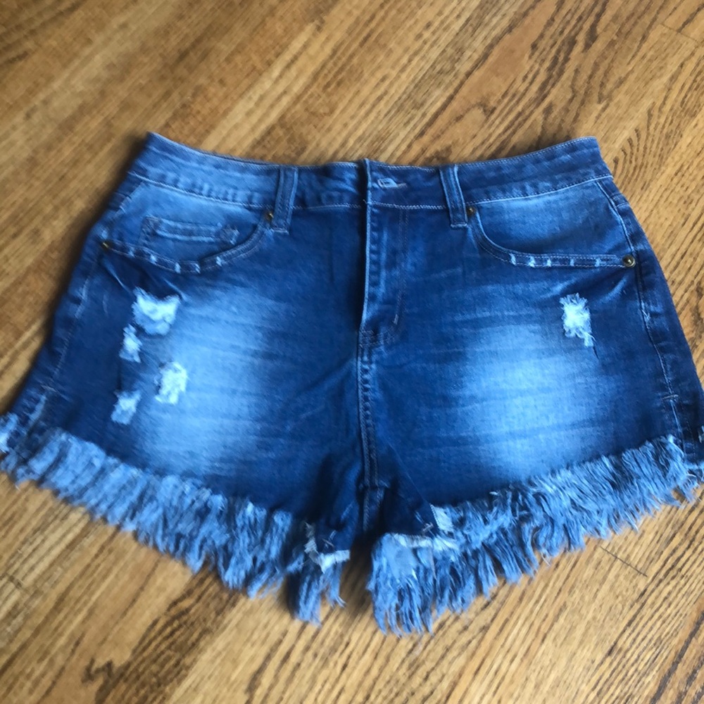 Ripped and fringed 3-4” Jean shorts